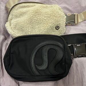 2 Lululemon fanny pack/ cross body bags
Black and cream colored Sherpa 
UEC